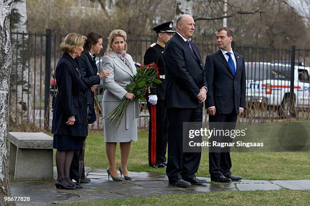 King Harald V and Queen Sonja of Norway, Russian President Dmitry Medvedev and his wife Svetlana Medvedeva visit the Soviet memorial at the Western...