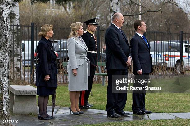 King Harald V and Queen Sonja of Norway, Russian President Dmitry Medvedev and his wife Svetlana Medvedeva visit the Soviet memorial at the Western...