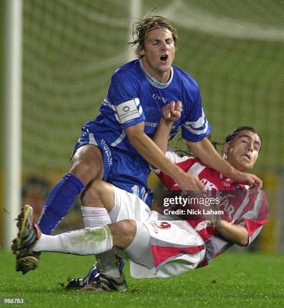 Damon Collina of Olympic is fouled by Rody Vargas of the Knights during the NSL Minor semi-final between Sydney Olympic and the Melbourne Knights at...