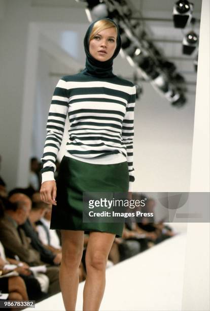 Kate Moss models Dolce and Gabanna at Milan Fashion Week circa 1996 in Milan.