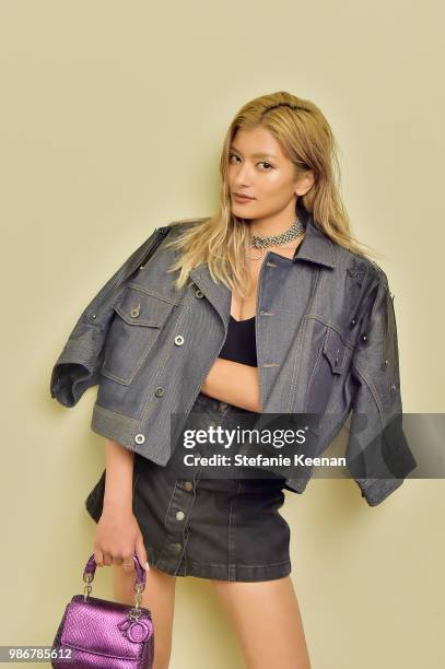 Rola attends Diesel Presents Scott Lipps Photography Exhibition 'Rocks Not Dead' at Sunset Tower on June 28, 2018 in Los Angeles, California.