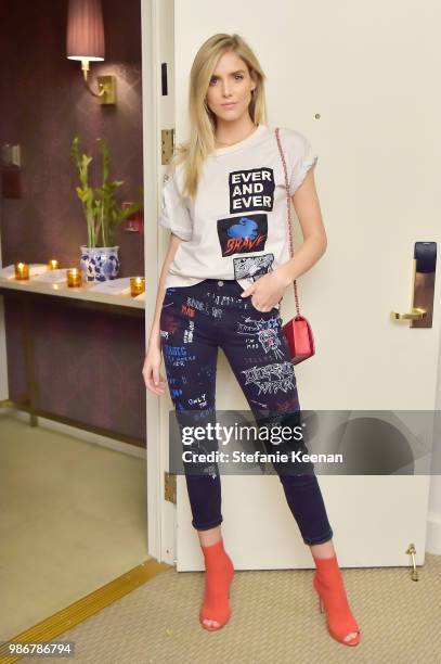 Carrie Riley attends Diesel Presents Scott Lipps Photography Exhibition 'Rocks Not Dead' at Sunset Tower on June 28, 2018 in Los Angeles, California.