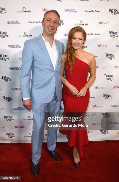 Director Jeremy Culver and actress Charleene Closshey poses during the "No Postage Necessary" Premiere on June 28, 2018 in Tampa, Florida.