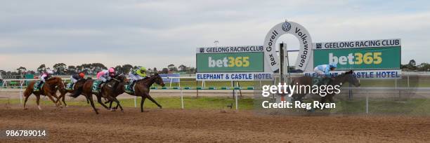 Clear Signal ridden by Damien Oliver wins the J.T Dixon BM70 Handicap at Geelong Synthetic Racecourse on June 29, 2018 in Geelong, Australia.