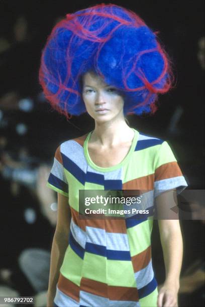 Kate Moss models Comme de Garcons at Paris Fashion Week circa 1995 in Paris.