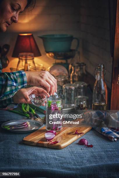 preserving organic red onions in jars - pickle relish stock pictures, royalty-free photos & images