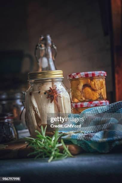 preserving organic mushrooms in jars - preserved in oil stock pictures, royalty-free photos & images
