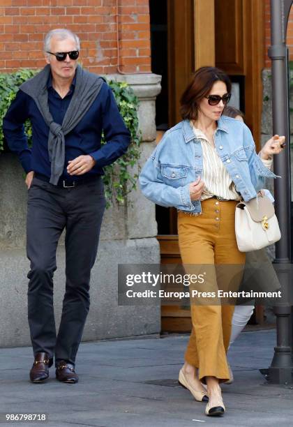 Mexican Adriana Abascal and her husband Emmanuel Schreder leave a restaurant on May 13, 2018 in Madrid, Spain.