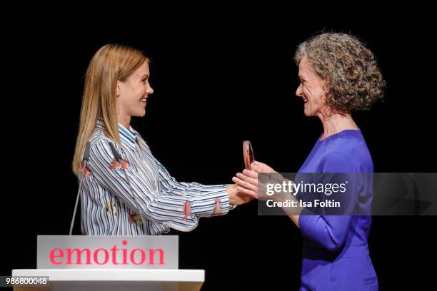 German actress Wolke Hegenbarth with the award winner during the Emotion Award at Curio Haus on June 28, 2018 in Hamburg, Germany.