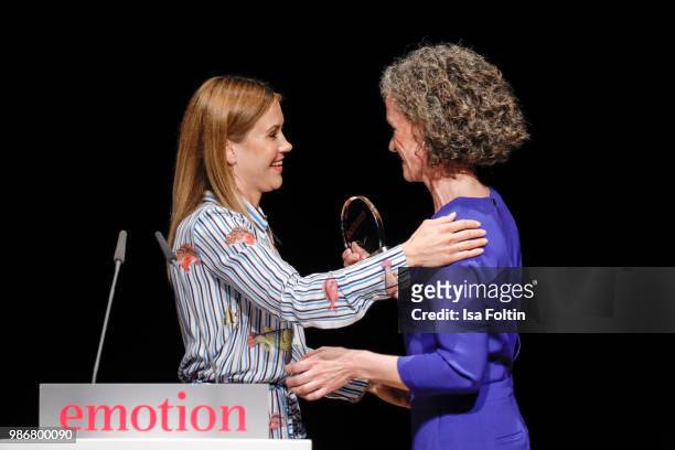 German actress Wolke Hegenbarth with the award winner during the Emotion Award at Curio Haus on June 28, 2018 in Hamburg, Germany.