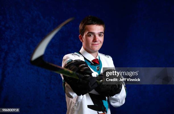 Ryan Merkley poses for a portrait after being selected twenty-first overall by the San Jose Sharks during the first round of the 2018 NHL Draft at...