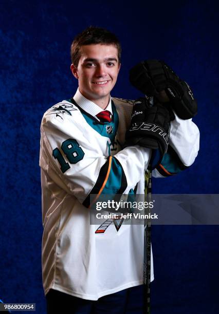 Ryan Merkley poses for a portrait after being selected twenty-first overall by the San Jose Sharks during the first round of the 2018 NHL Draft at...