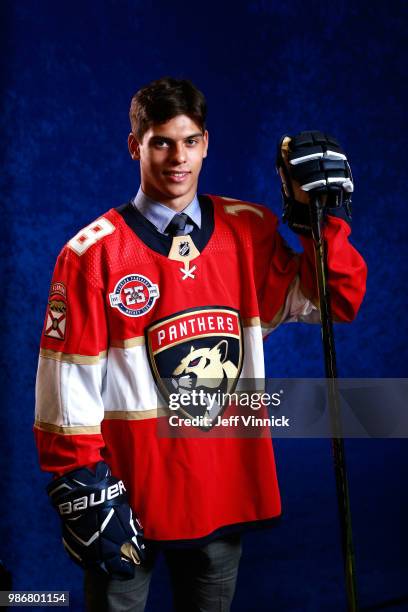 Grigori Denisenko poses for a portrait after being selected fifteenth overall by the Florida Panthers during the first round of the 2018 NHL Draft at...