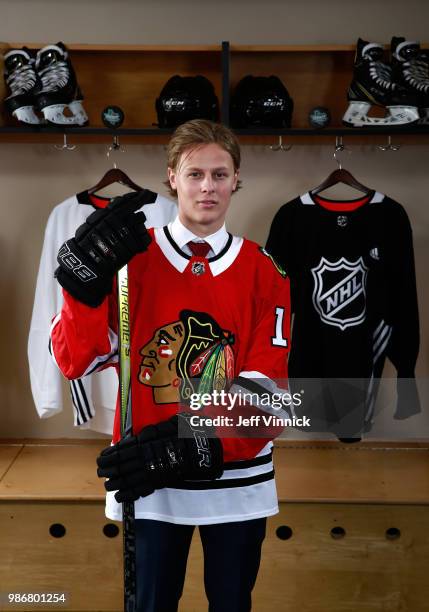 Adam Boqvist poses for a portraitafter being selected eighth overall by the Chicago Blackhawks during the first round of the 2018 NHL Draft at...