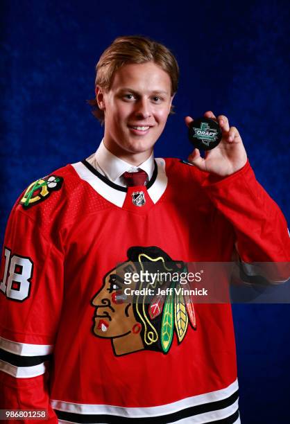 Adam Boqvist poses for a portraitafter being selected eighth overall by the Chicago Blackhawks during the first round of the 2018 NHL Draft at...