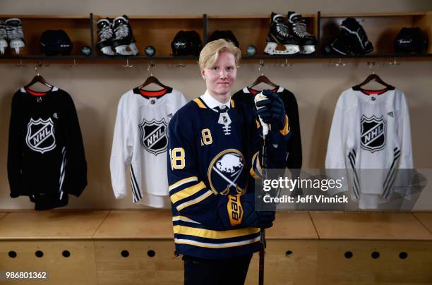 Rasmus Dahlin poses for a portrait after being selected first overall by the Buffalo Sabres during the first round of the 2018 NHL Draft at American...