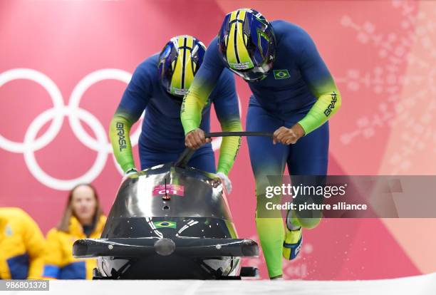 February 2018, South Korea, Pyeongchang: Olympics, Bobsleigh, Two Man Heat, Men, Second Run, Alpensia Sliding Centre: Pilot Edson Ricardo Martins and...