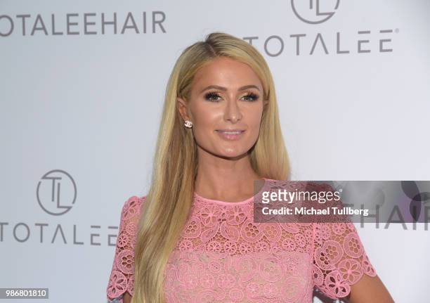 Paris Hilton attends the launch of stylist Lee Rittiner's TOTALEE hair care system and atelier at TOTALEE on the ALLEY Beverly Hills on June 28, 2018...