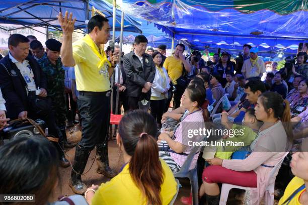 Prime Minister Prayut Chan-O-Cha meets family members of the missing children and their coach at Khun Nam Nang Non Forest Park after supervising the...