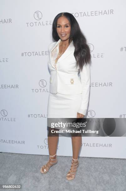 Beverly Johnson attends the launch of stylist Lee Rittiner's TOTALEE hair care system and atelier at TOTALEE on the ALLEY Beverly Hills on June 28,...