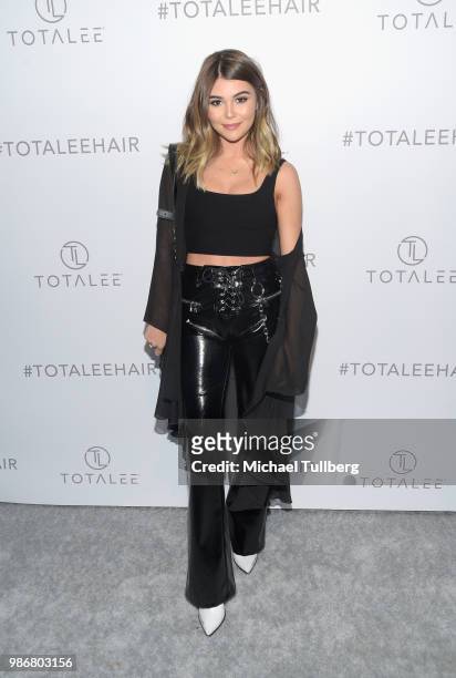 Social media influencer Olivia Jade attends the launch of stylist Lee Rittiner's TOTALEE hair care system and atelier at TOTALEE on the ALLEY Beverly...