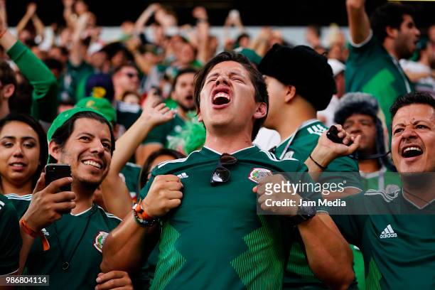 Fans of Mexico celebrate during the 2018 FIFA World Cup Russia group F match between Mexico and Sweden at Ekaterinburg Arena on June 27, 2018 in...