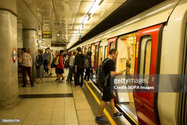 People getting in and out of the London underground. London is the Capital city of England and the United Kingdom, it is located in the south east of...