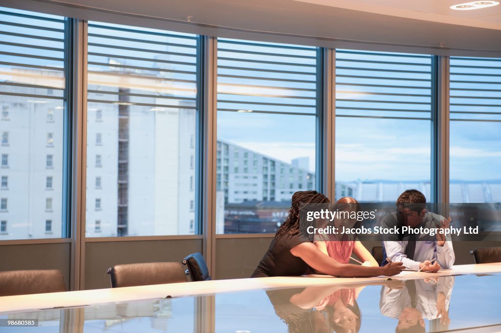 Business people working in conference room