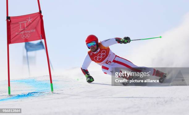 Marcel Hirscher of Austria competes in the Men's Giant slalom Alpine Skiing first heat event during the Pyeongchang 2018 Winter Olympic Games at the...