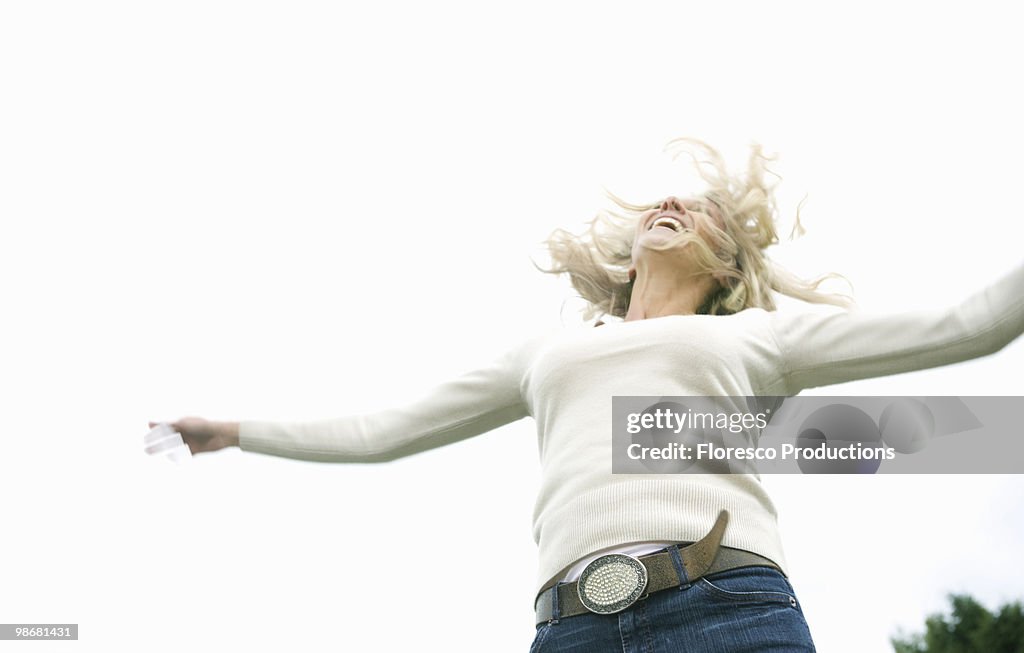 Woman jumping with joy