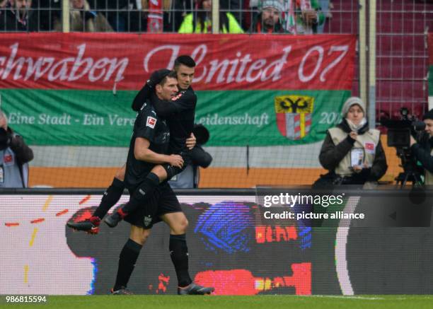 Dpatop - Stuttgart's Mario Gomez celebrates scoring his side's 1st goal during the German Bundesliga soccer match between FC Augsburg and VfB...