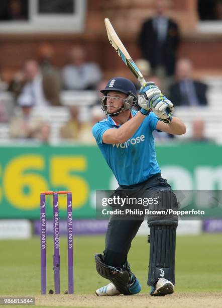 England batsman Jos Buttler hits a six during his innings of 121 in the 4th Royal London One Day International between England and Sri Lanka at...