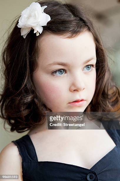 Little Girl With Flower In Her Hair High-Res Stock Photo - Getty Images