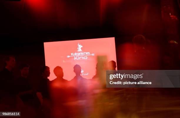 February 2018, Germany, Berlin: Berlinale, Kulinarisches Kino, "Chef Flynn": guests wait for the begin of the film. Photo: Jens...