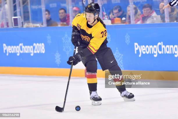 Germany's Dominik Kahun controls the puck during the Group C men's ice hockey match between Germany and Norway on day nine of the PyeongChang 2018...