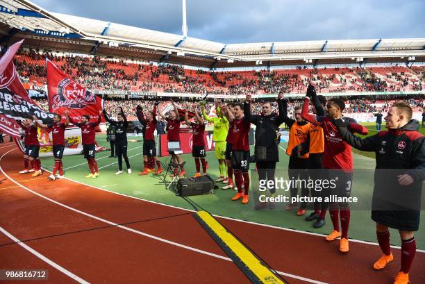 February 2018, Germany, Nuremberg: German 2nd division Bundesliga soccer match 1. FC Nuremberg vs MSV Duisburg: Nuremberg's players celebrate their...