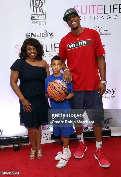 Erika Janee Jordan and Jerome 'Junkyard Dog' Williams attend Suite Life Welcome The BIG 3 NBA Veterans To Chicago at Perillo Rolls Royce on June 28,...