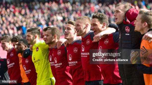 Dpatop - 18 February 2018, Germany, Nuremberg: German 2nd division Bundesliga soccer match 1. FC Nuremberg vs MSV Duisburg: Nuremberg's team...