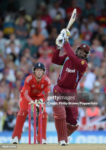 West Indies batsman Chris Gayle hits a six during the 2nd Twenty20 International between West Indies and England at the Kensington Oval, Bridgetown,...
