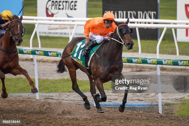 Lovewithouttragedy ridden by Dwayne Dunn wins the IGA Liquor BM64 Handicap at Geelong Synthetic Racecourse on June 29, 2018 in Geelong, Australia.