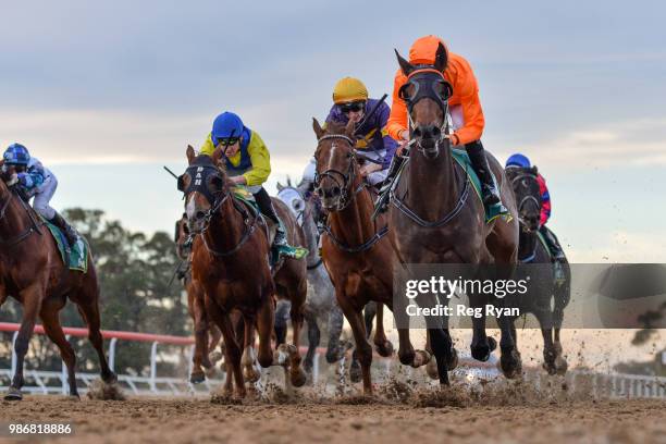 Lovewithouttragedy ridden by Dwayne Dunn wins the IGA Liquor BM64 Handicap at Geelong Synthetic Racecourse on June 29, 2018 in Geelong, Australia.