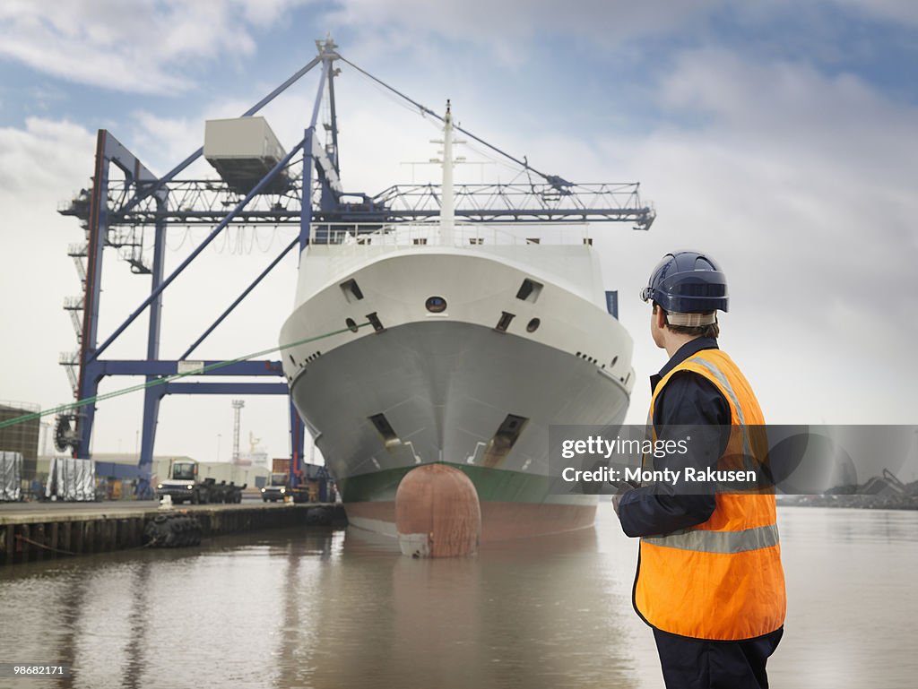 Port Workker Port Worker Looking At Container Ship High-Res Stock Photo - Getty Images