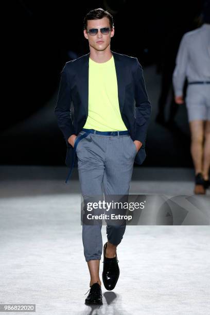 Model walks the runway at the Antonio Miro show during the Barcelona 080 Fashion Week on June 27, 2018 in Barcelona, Spain.