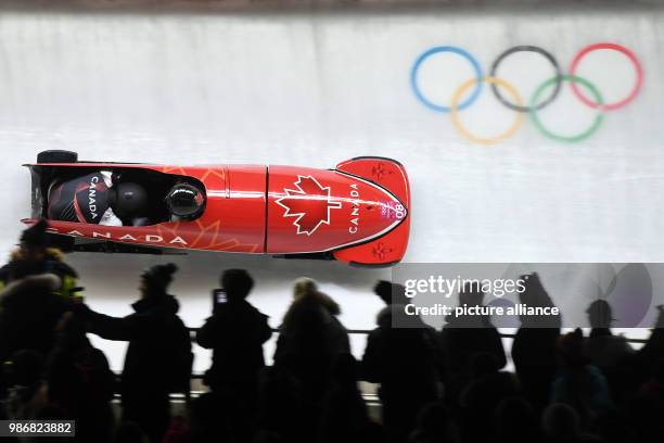 February 2018, South Korea, Pyeongchang, Olympics, bobsleigh, two-man seld, 3rd run, Alpensia Sliding Centre: Pilot Christopher Spring and pusher...