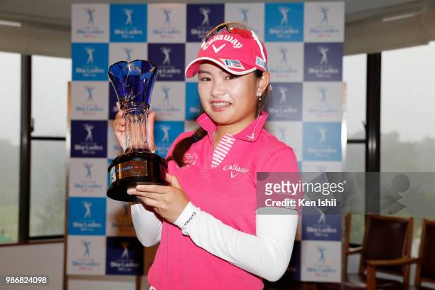 Yui Kawamoto of Japan holds the trophy after winning the final round of the Sky Ladies ABC Cup at ABC Golf Club on June 29, 2018 in Kato, Hyogo,...