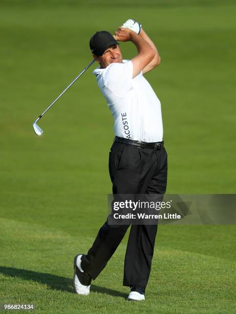 Jose Maria Olazabal of Spain plays his second shot on the 10th hole during the second round of the HNA Open de France at Le Golf National on June 29,...