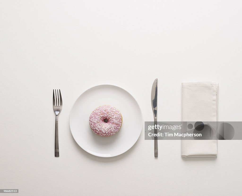 A doughnut on a plate