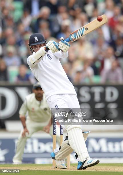 Stuart Broad of England plays a short-pitched delivery during the 5th Test match between England and India at The Oval, London, 17th August 2014....
