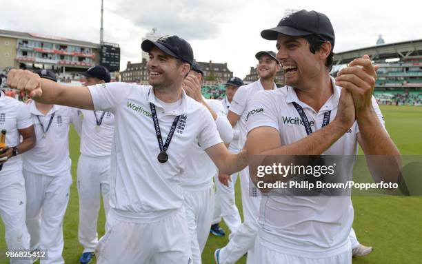 England captain Alastair Cook and James Anderson lead the England players on a lap of honour as they celebrate winning the 5th Test match between...
