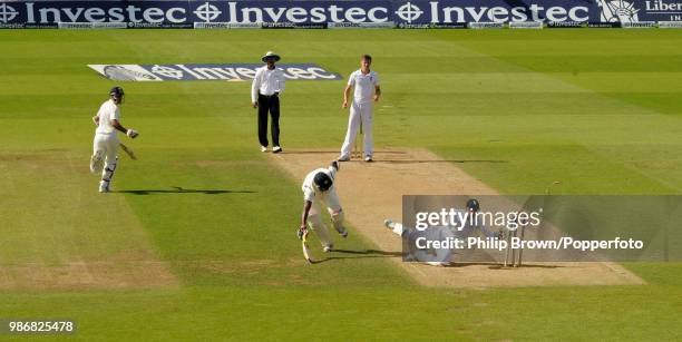 England wicketkeeper Jos Buttler runs out Varun Aaron of India during the 5th Test match between England and India at The Oval, London, 17th August...